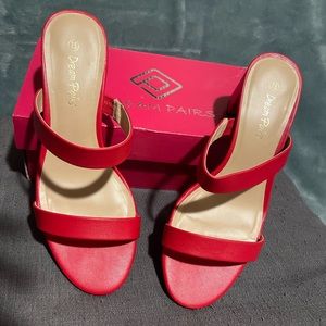 Women heeled strap sandals.